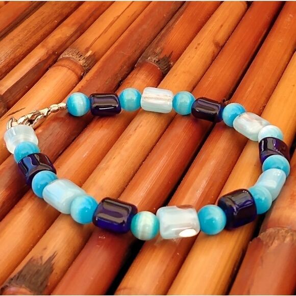 Jewelry - HANDMADE ALL Glass Variety of Blue & White Beaded Bracelet Claw Closure
